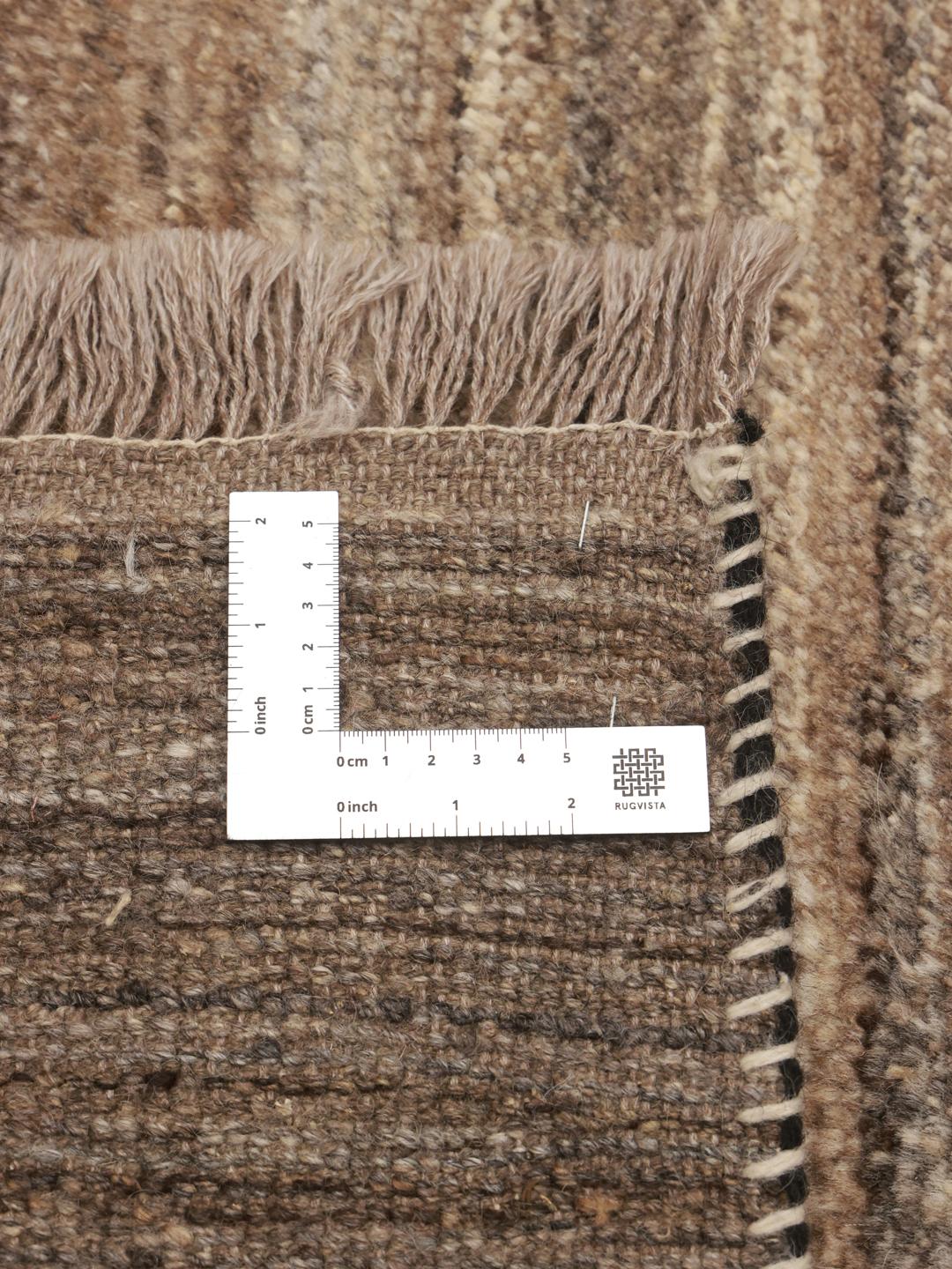 Hand-knotted Gabbeh rug from the Middle East in brown tones