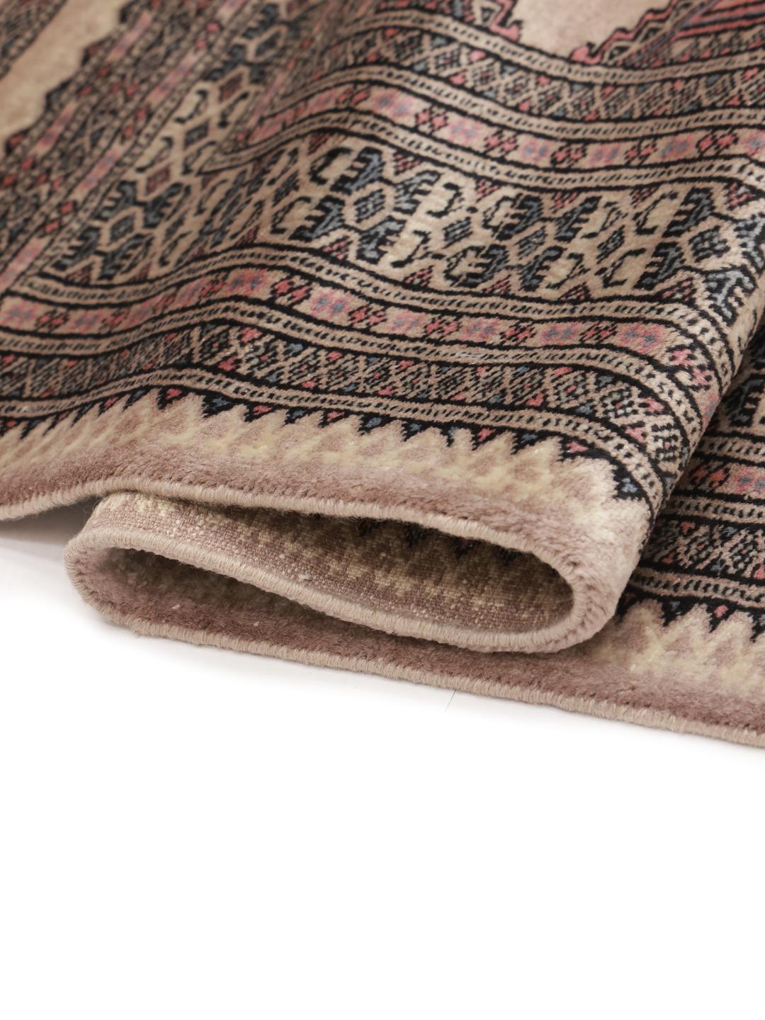 Hand-knotted Pakistani rug with traditional beige geometric motifs
