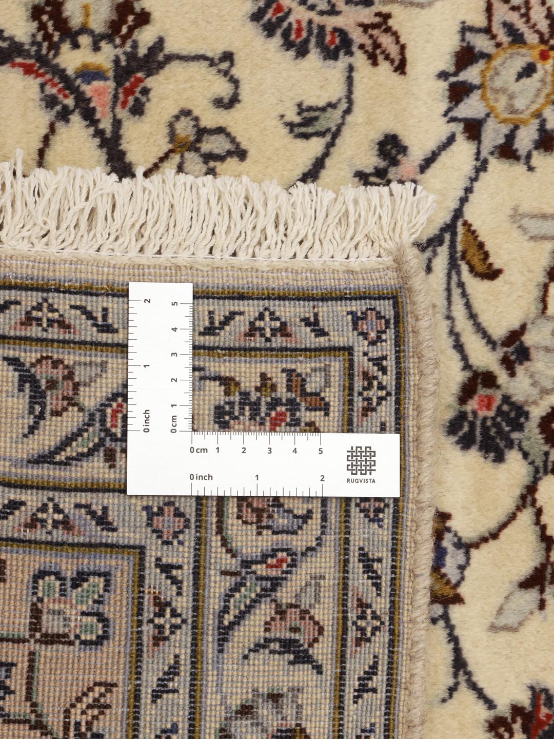 Hand-knotted Keshan rug from the Middle East with a floral medallion pattern in beige