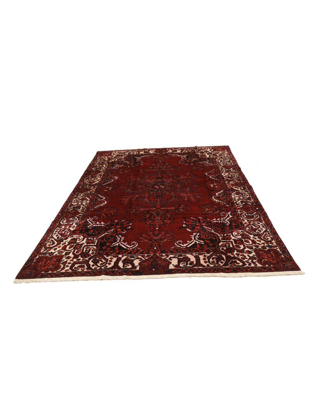 Hand-knotted Bakhtiar rug from the Middle East in dark-red wool