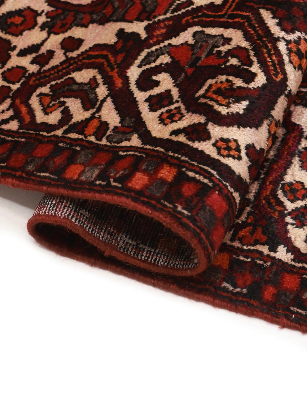 Hand-knotted Bakhtiar rug from the Middle East in dark-red wool