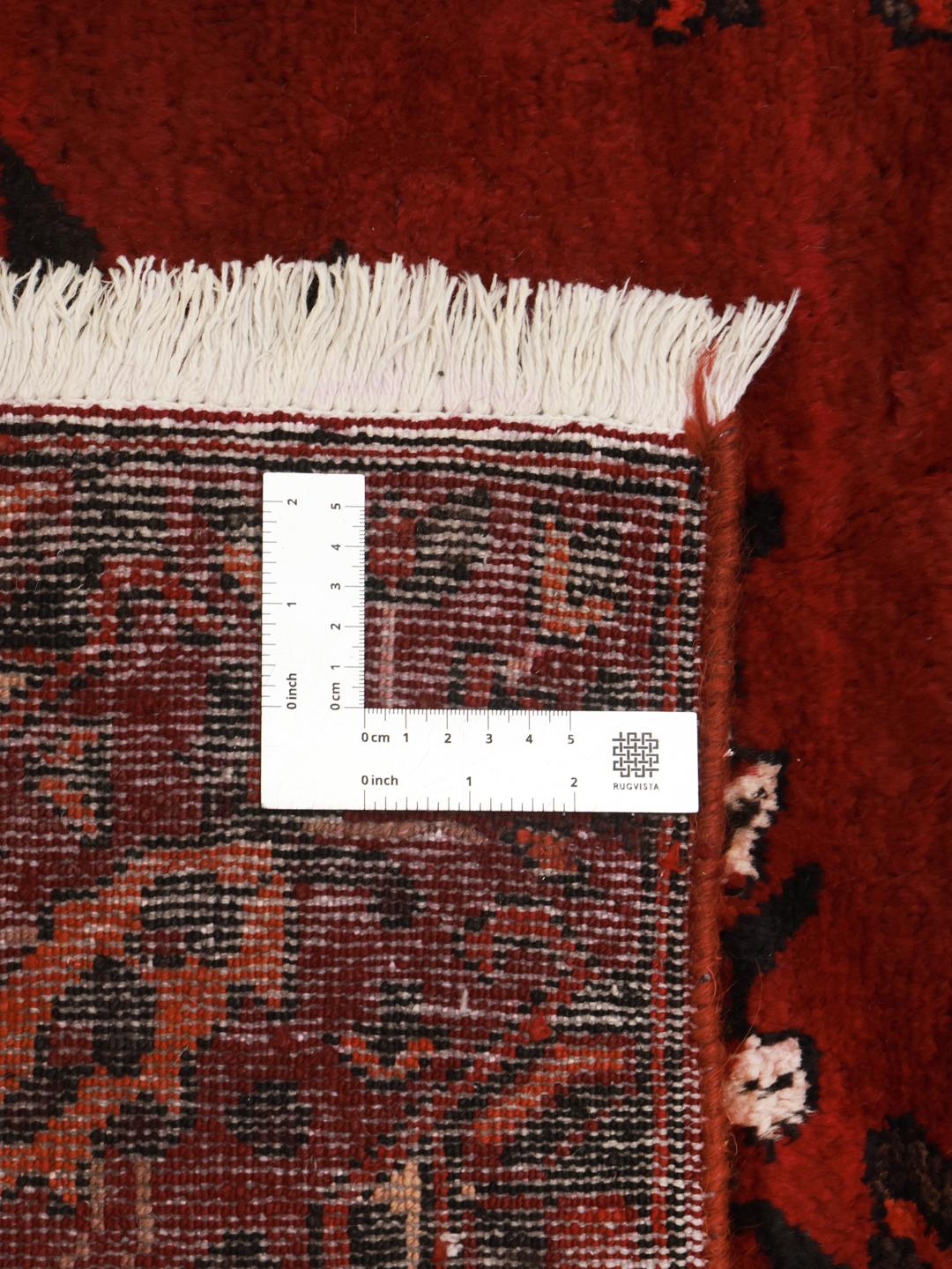 Hand-knotted Bakhtiar rug from the Middle East in dark-red wool