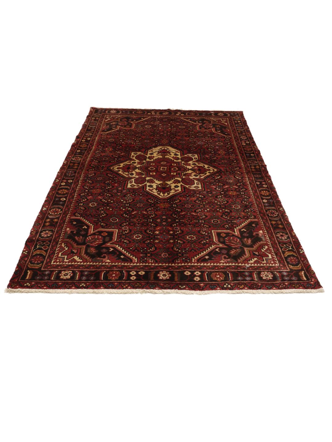 Hand-knotted Hosseinabad rug from the Middle East in dark-red tones