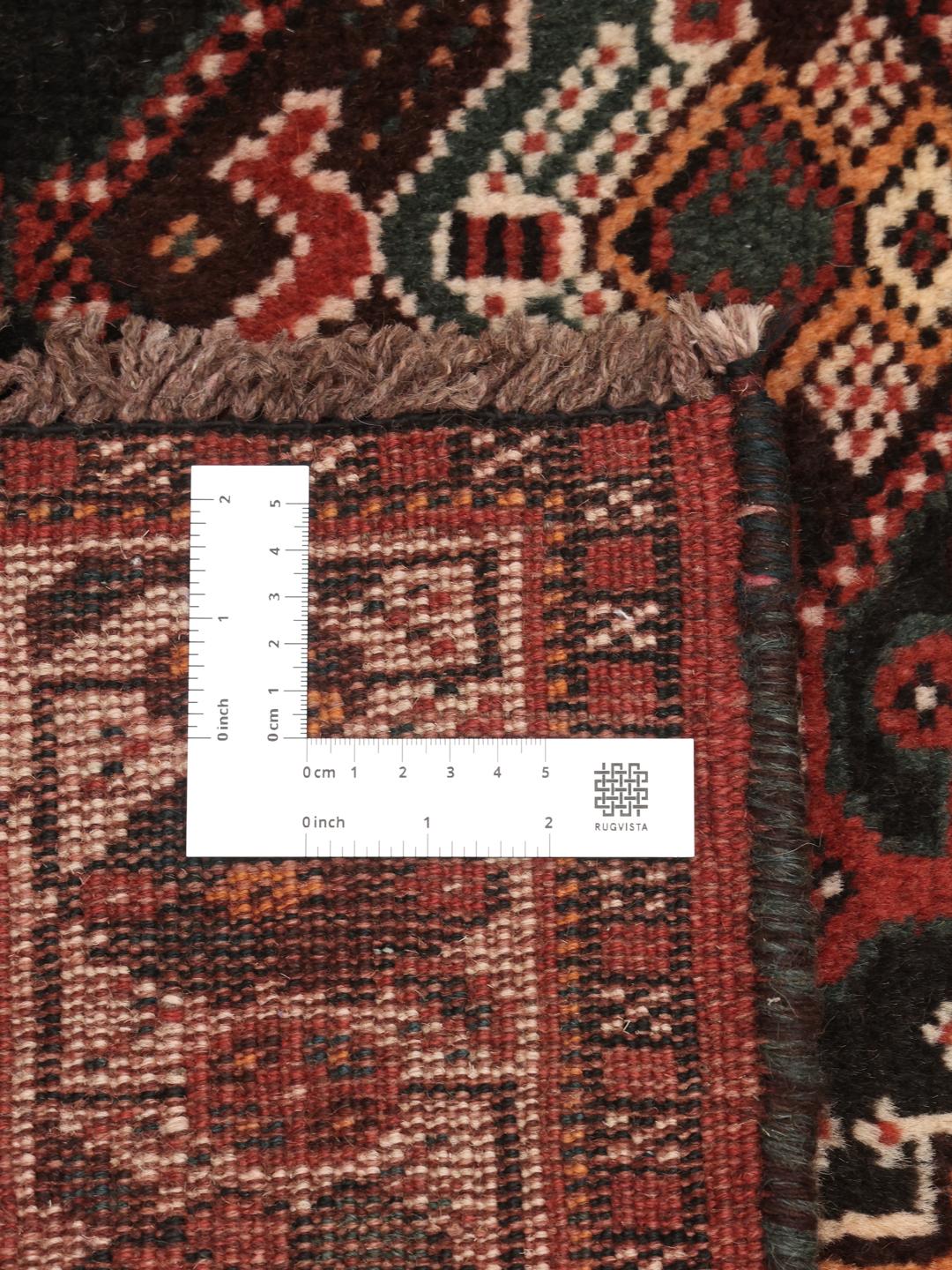 Hand-knotted Middle Eastern Shiraz rug in dark red and black with geometric patterns