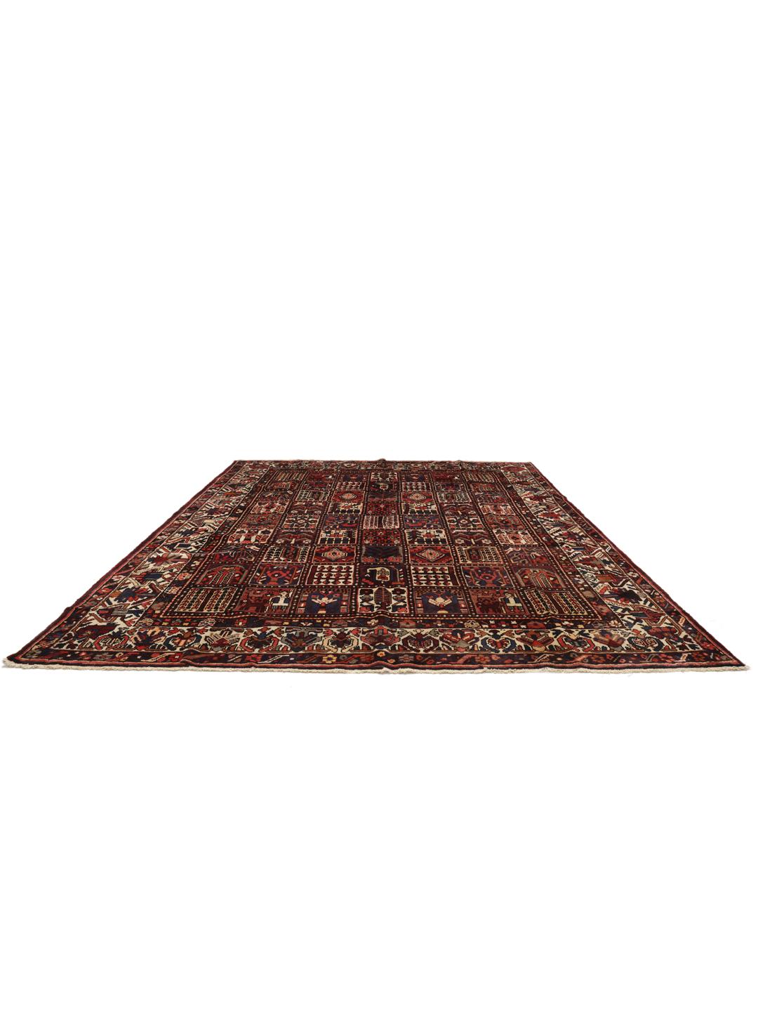 Hand-knotted Bakhtiari rug from the Middle East in dark red and multicolour hues.
