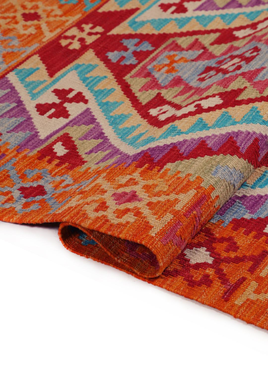 Hand-woven Afghan Kelim rug featuring geometric patterns in multicolor Wool
