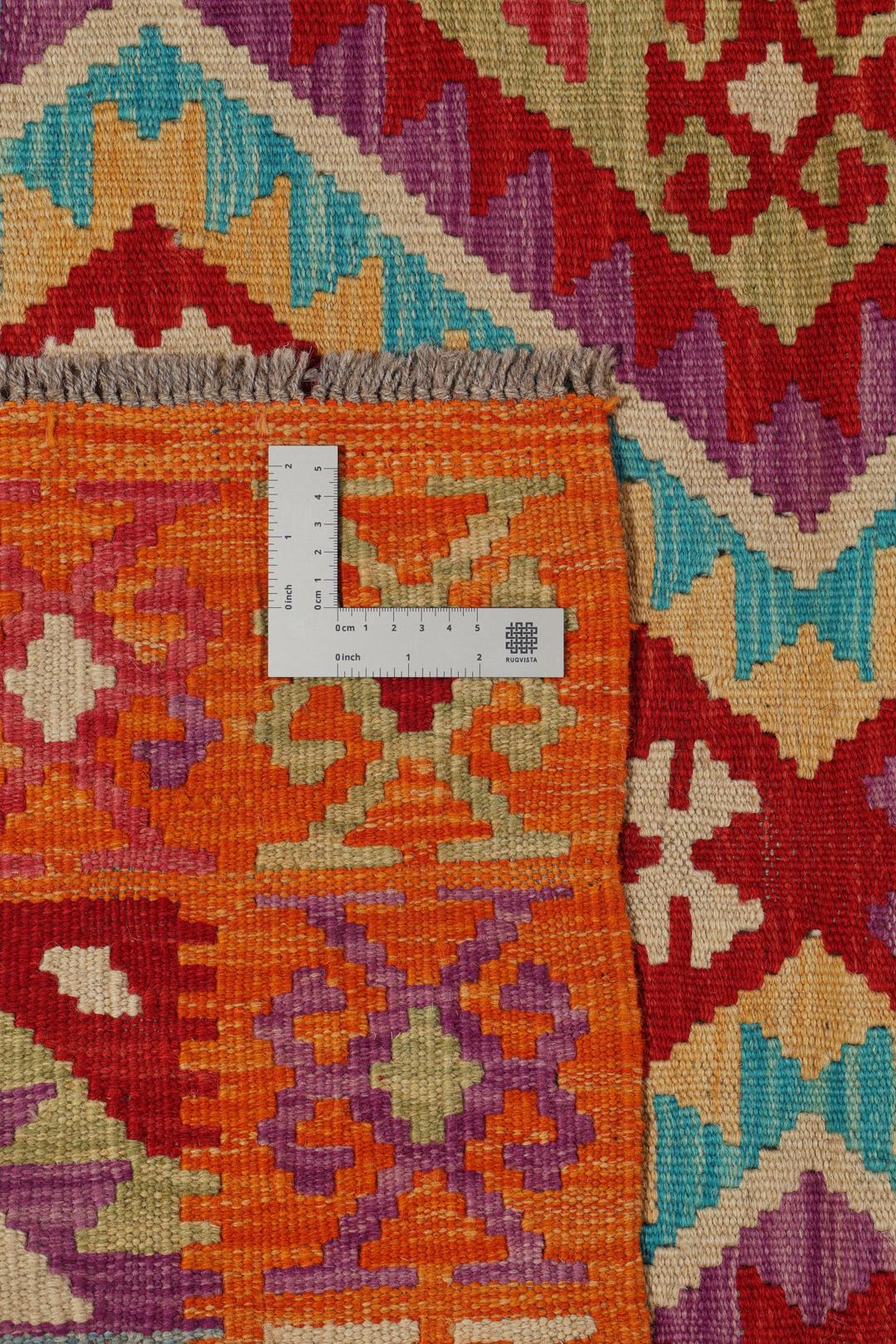 Hand-woven Afghan Kelim rug featuring geometric patterns in multicolor Wool