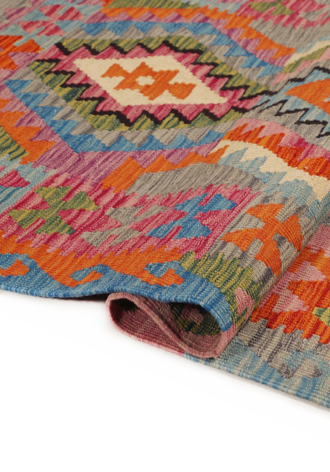 Hand-woven Afghan Kelim rug featuring vibrant geometric patterns in multicolor Wool