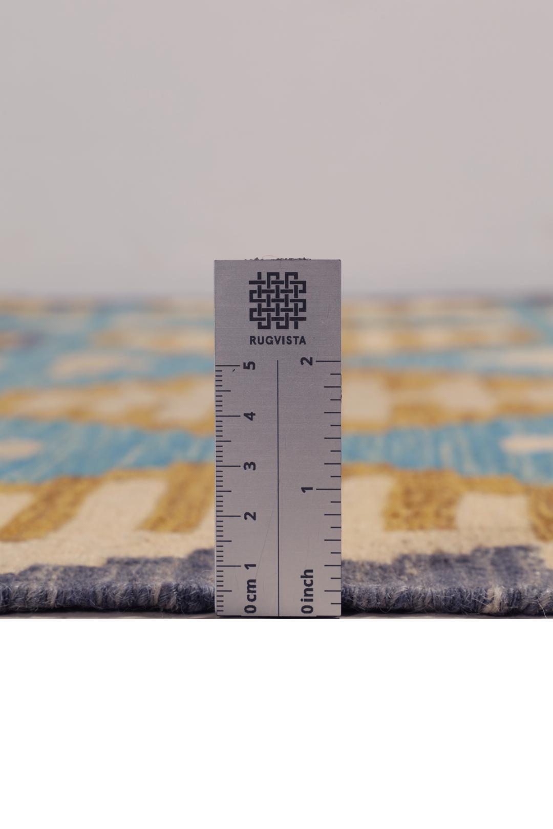 Hand-woven Afghan Kelim rug in blue and yellow with geometric patterns