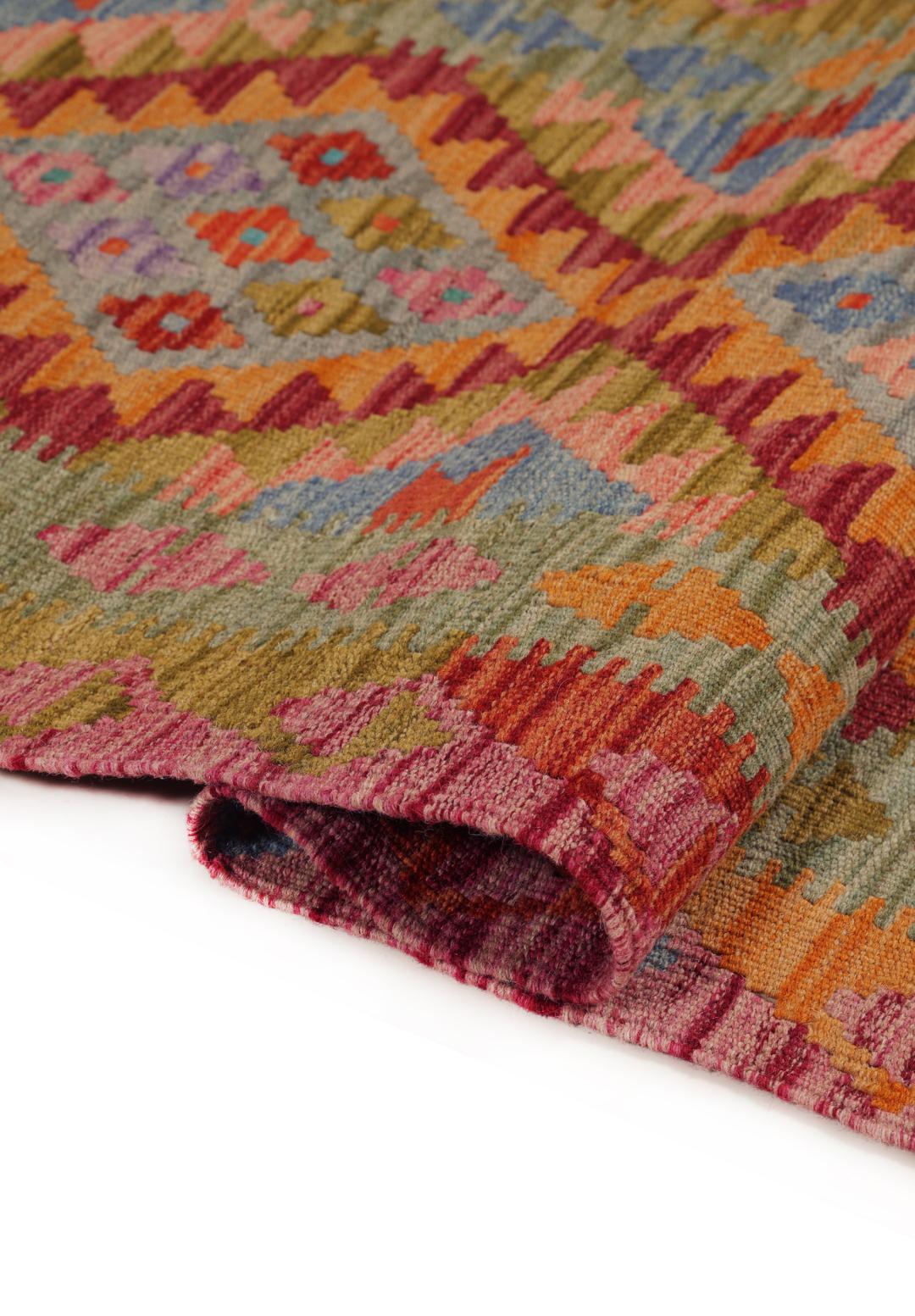 Hand-woven Afghan runner with a vibrant geometric diamond pattern in multicolor wool