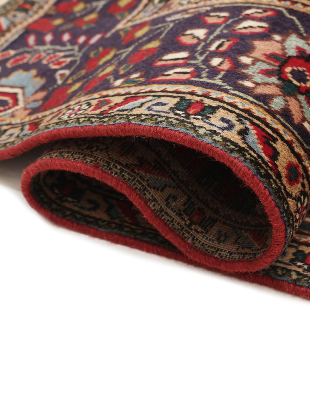 Handmade Tabriz rug from the Middle East in red