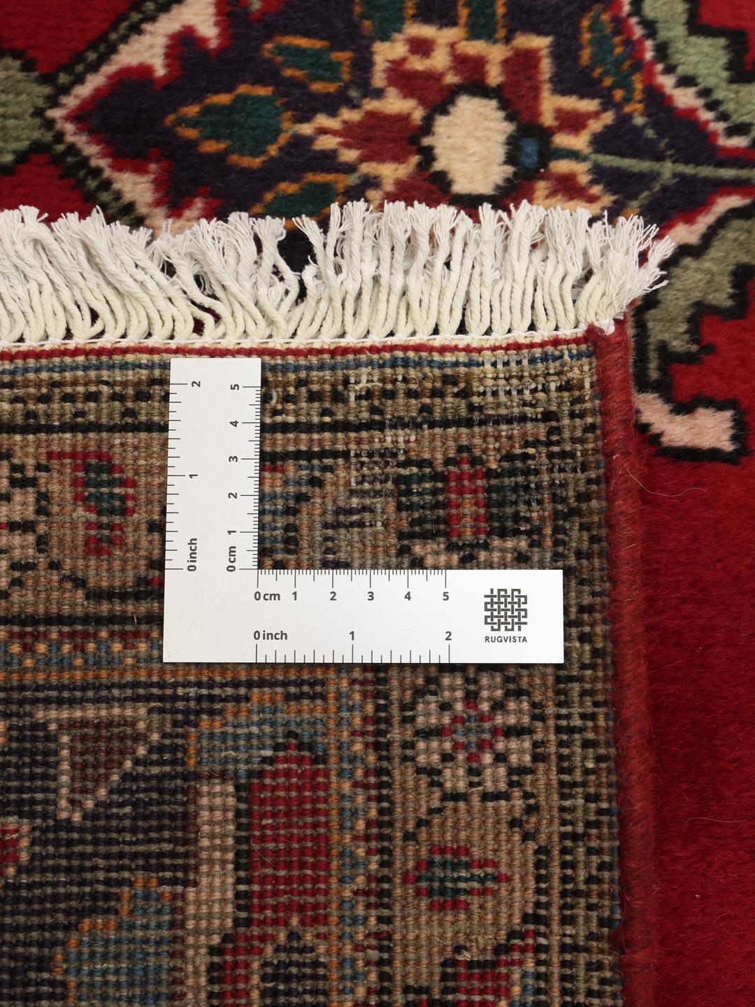 Handmade Tabriz rug from the Middle East in red