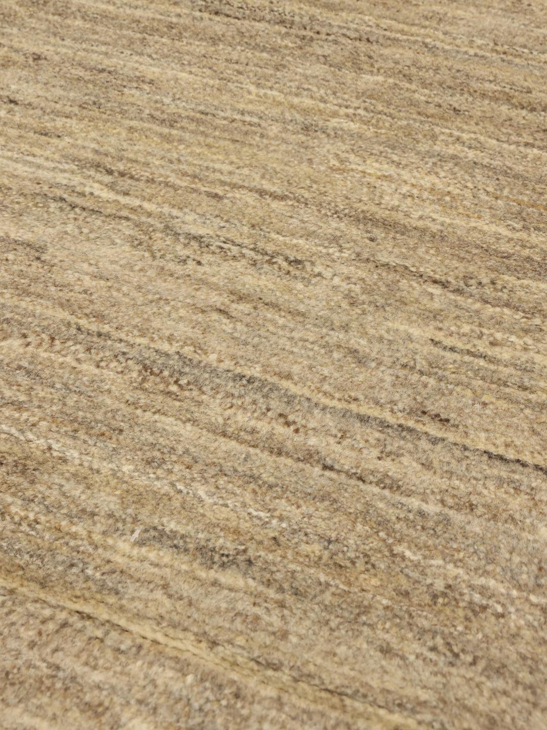Hand-knotted Gabbeh rug from the Middle East in beige tones