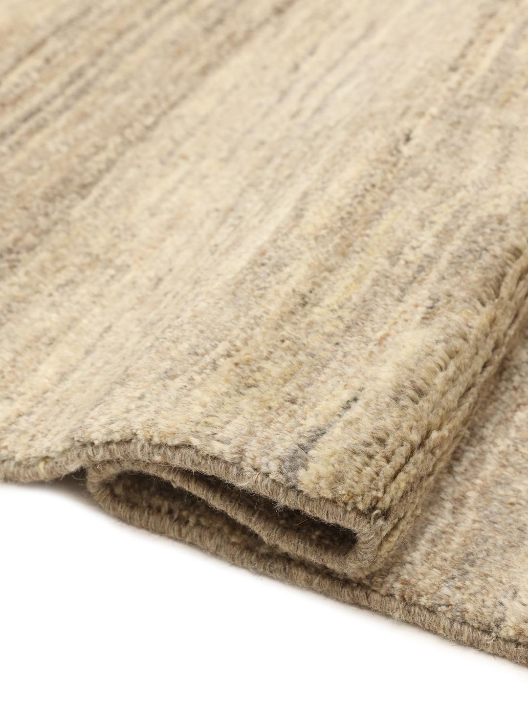 Hand-knotted Gabbeh rug from the Middle East in beige tones