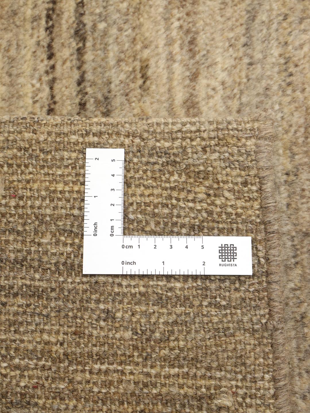 Hand-knotted Gabbeh rug from the Middle East in beige tones