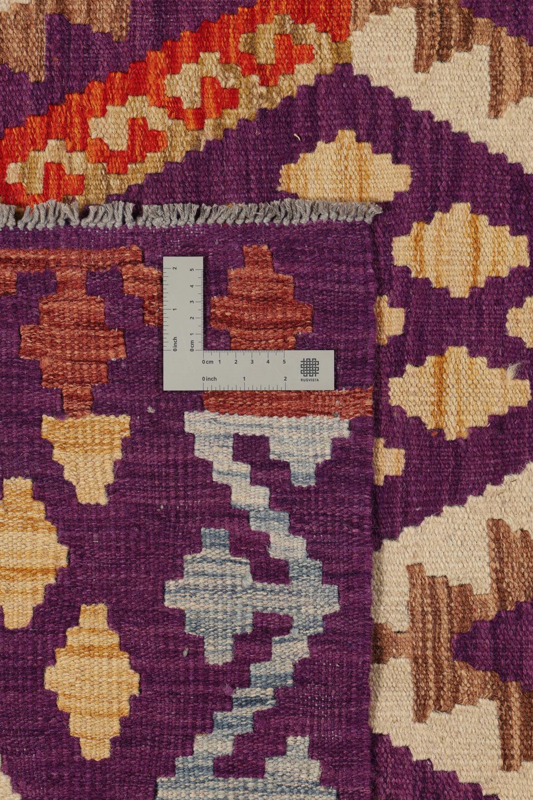 Håndvævet Kelim Afghan Old Style-tæppe med livlige lilla og geometriske mønstre.