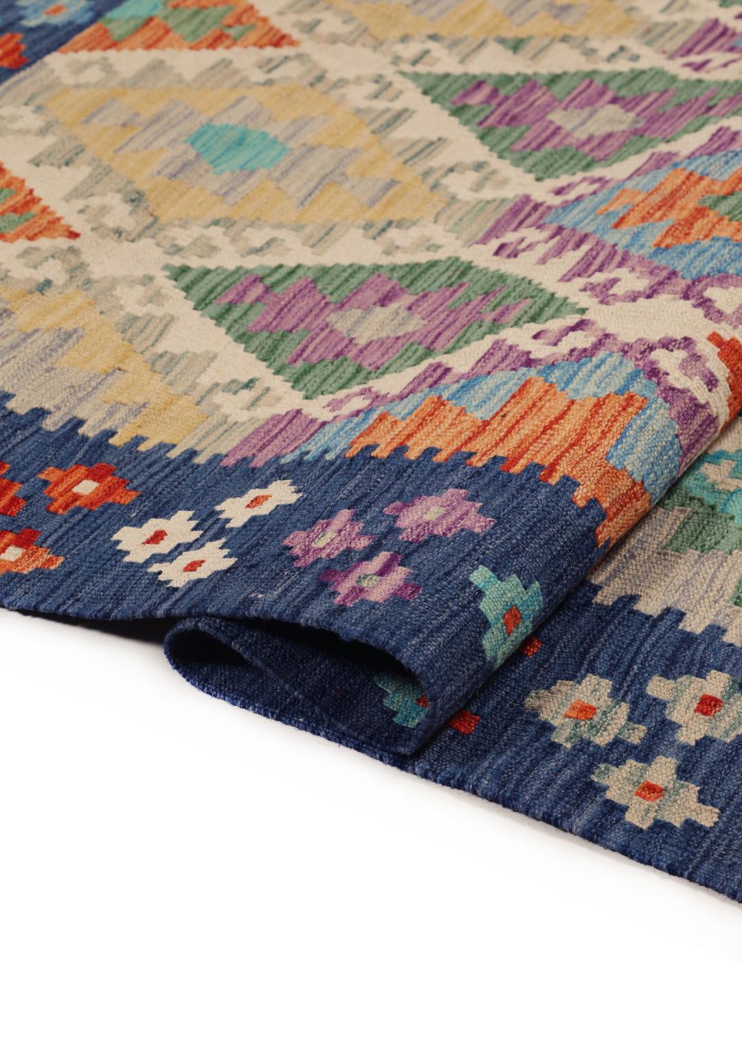 Hand-woven Afghan Kelim rug featuring a colourful geometric diamond pattern in a vibrant multicolor palette.