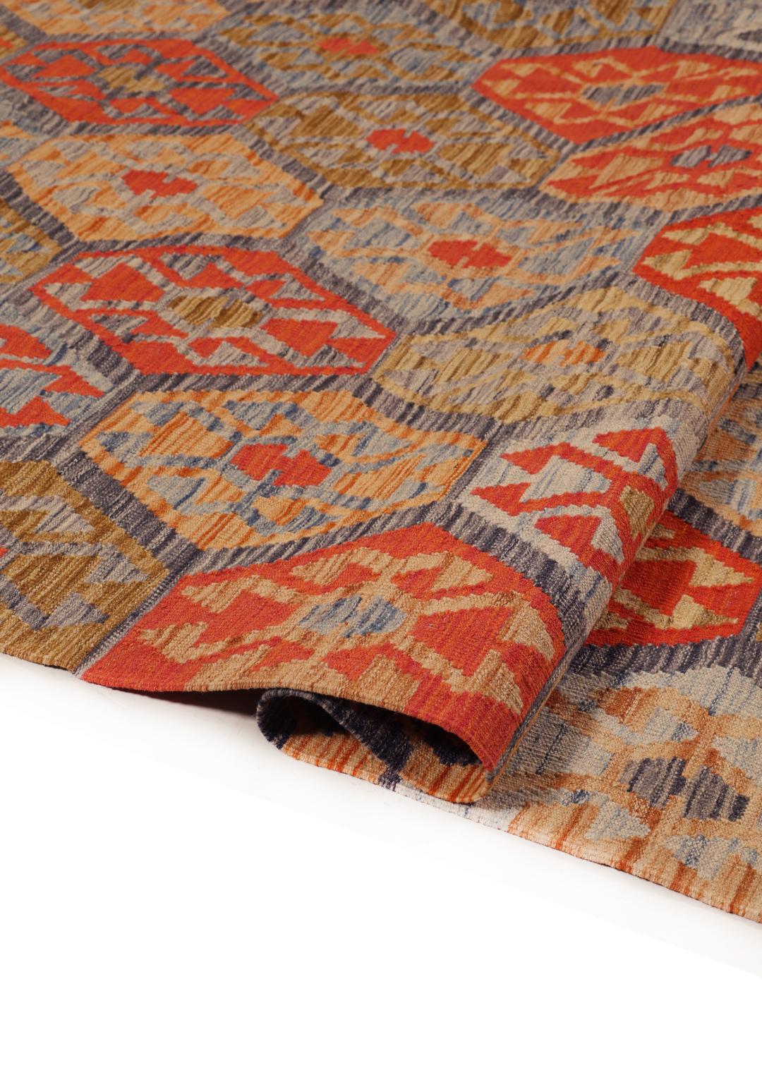 Hand-woven Afghan Kelim rug with geometric patterns in multicolour