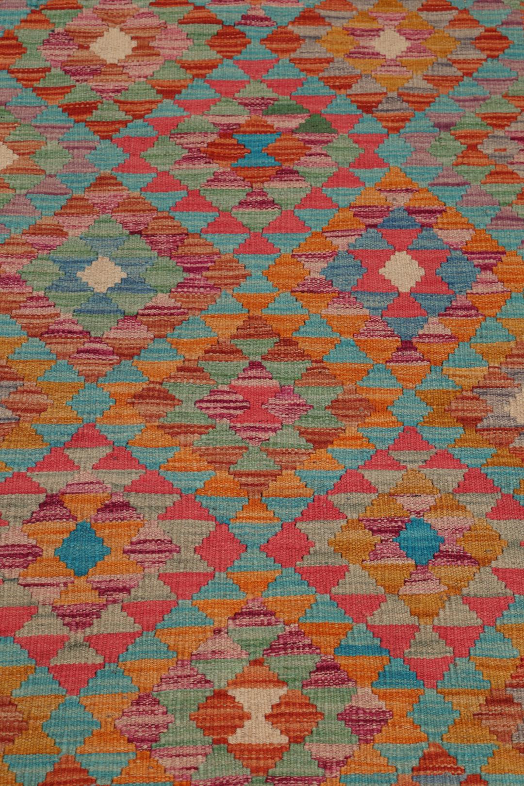 Runner afghano tessuto a mano con un vivace motivo geometrico multicolore