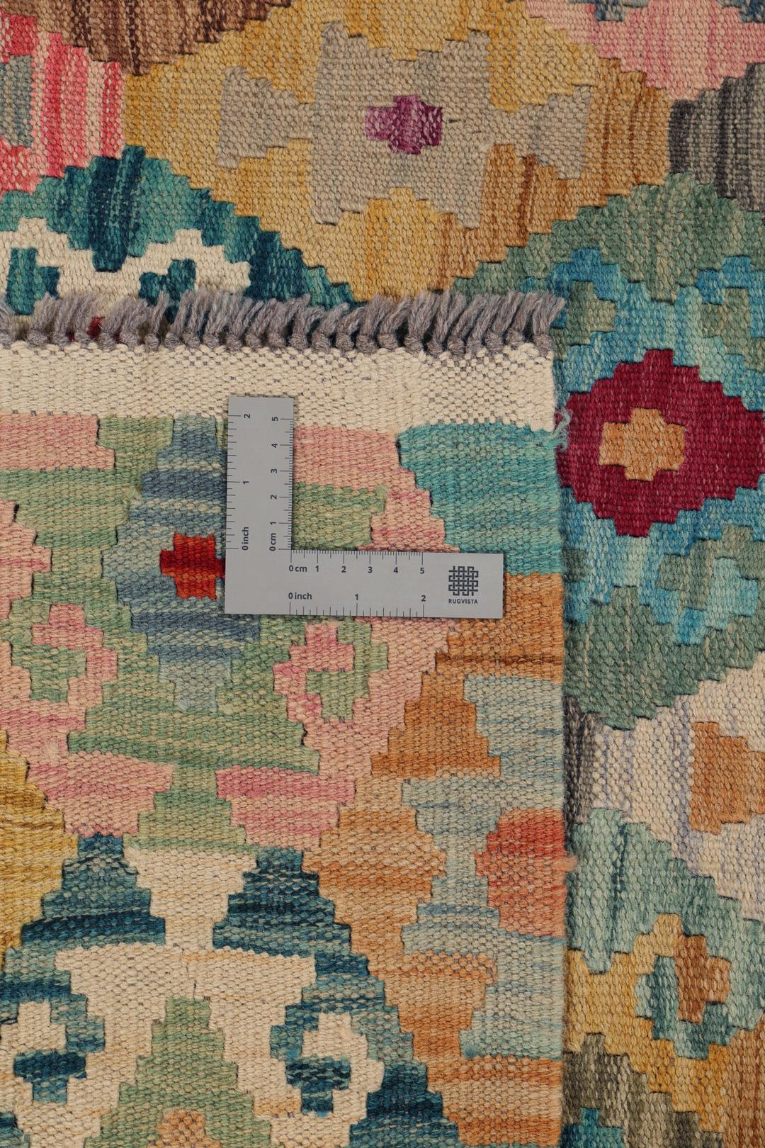 Handgewebter Afghan Kelim mit lebendigem, mehrfarbigem geometrischem Muster