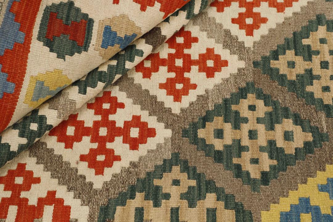 Håndvævet Kilim Qashqai-tæppe med levende geometriske mønstre i flerfarvet uld fra Mellemøsten