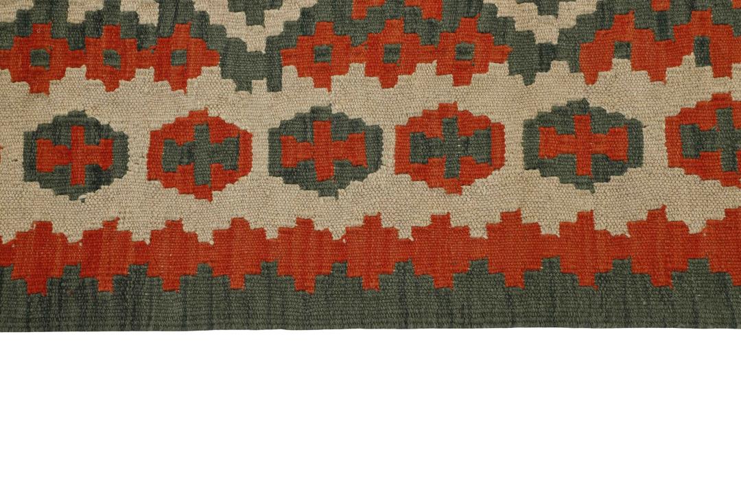 Handgeweven Kilim Qashqai tapijt met levendige meerkleurige geometrische ruitpatronen