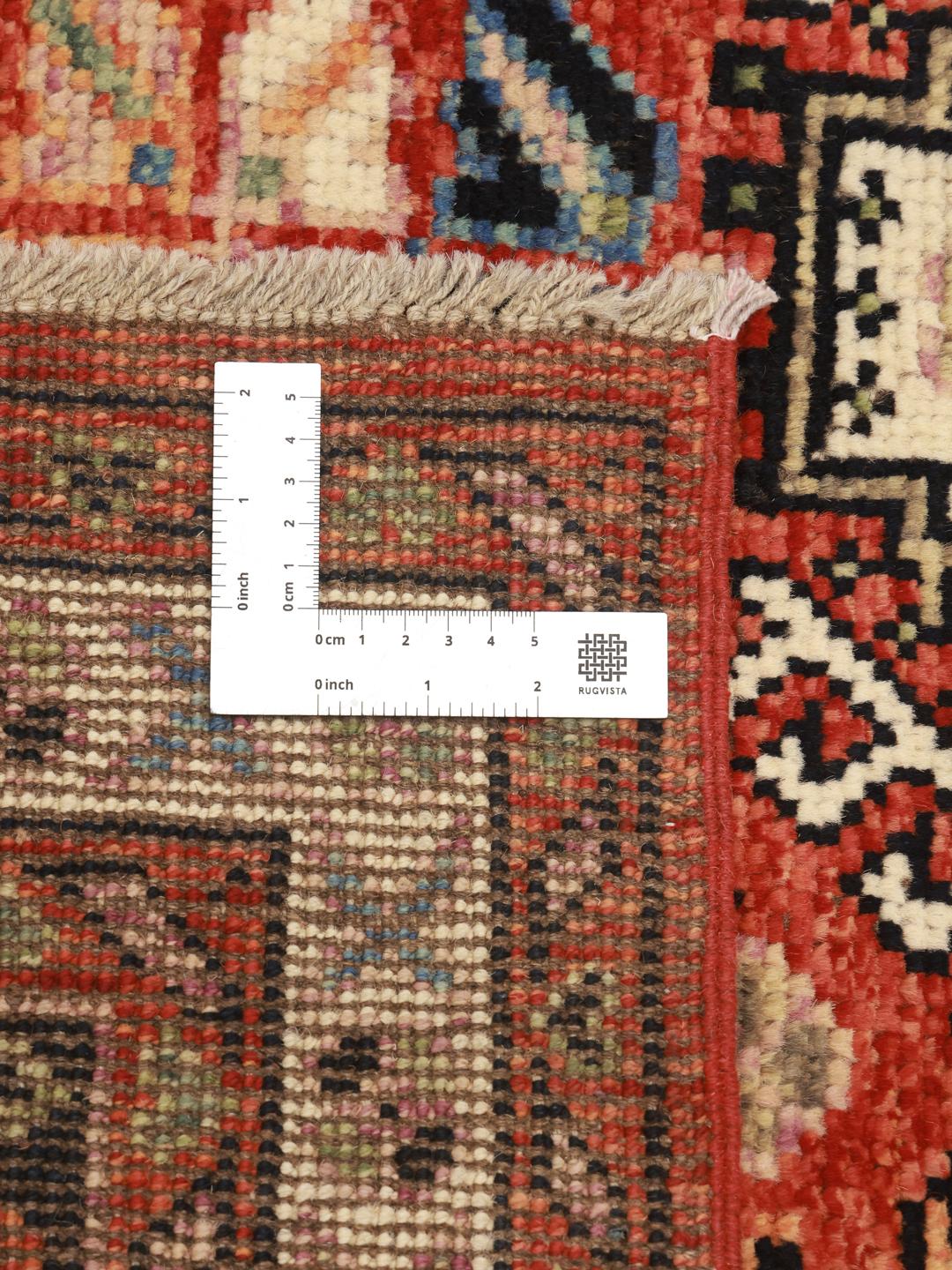 Tapis afghan Kazak noué à la main dans des tons rouge et noir