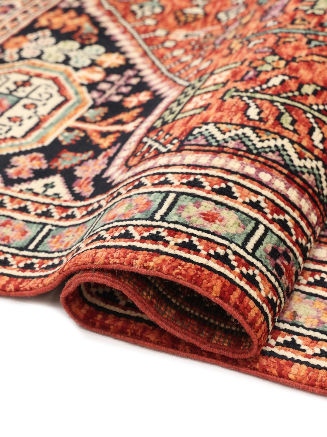 Tapis Kazak noué à la main provenant d'Afghanistan dans des tons rouge et bleu foncé