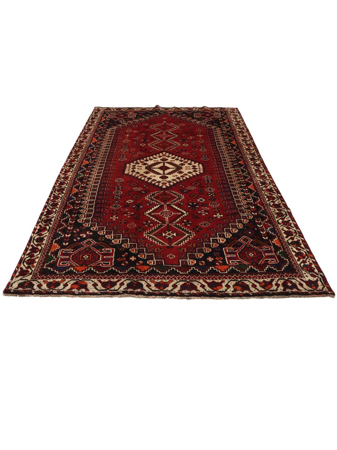 Hand-knotted Shiraz rug from the Middle East in dark red and dark blue