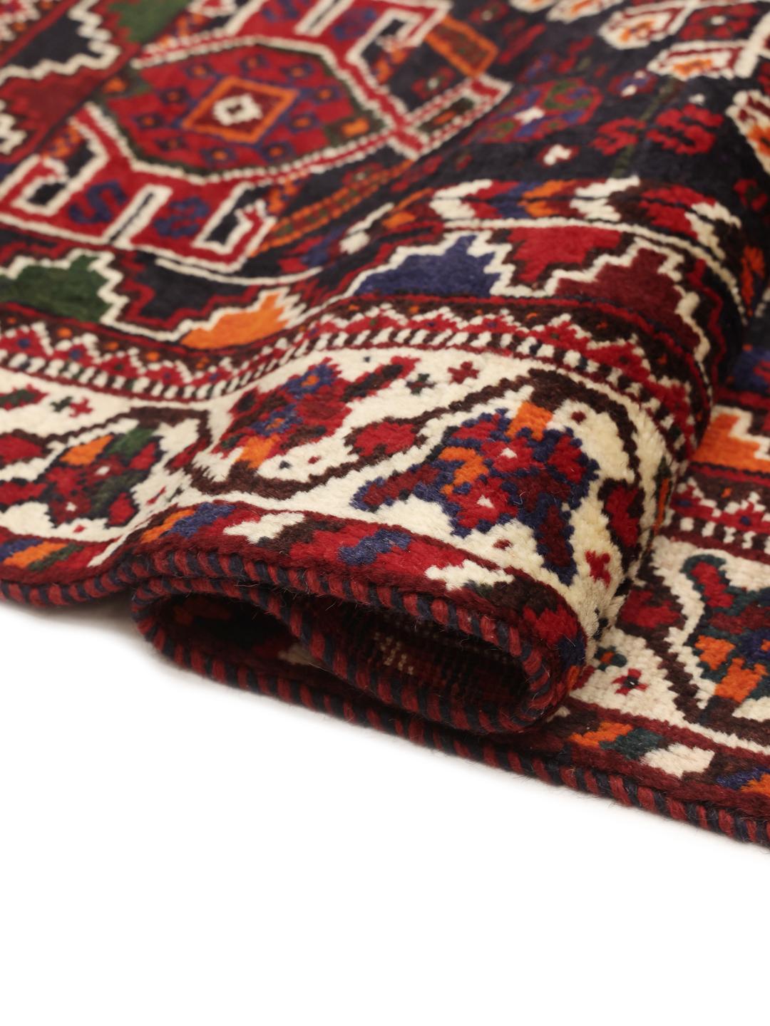 Hand-knotted Shiraz rug from the Middle East in dark red and dark blue