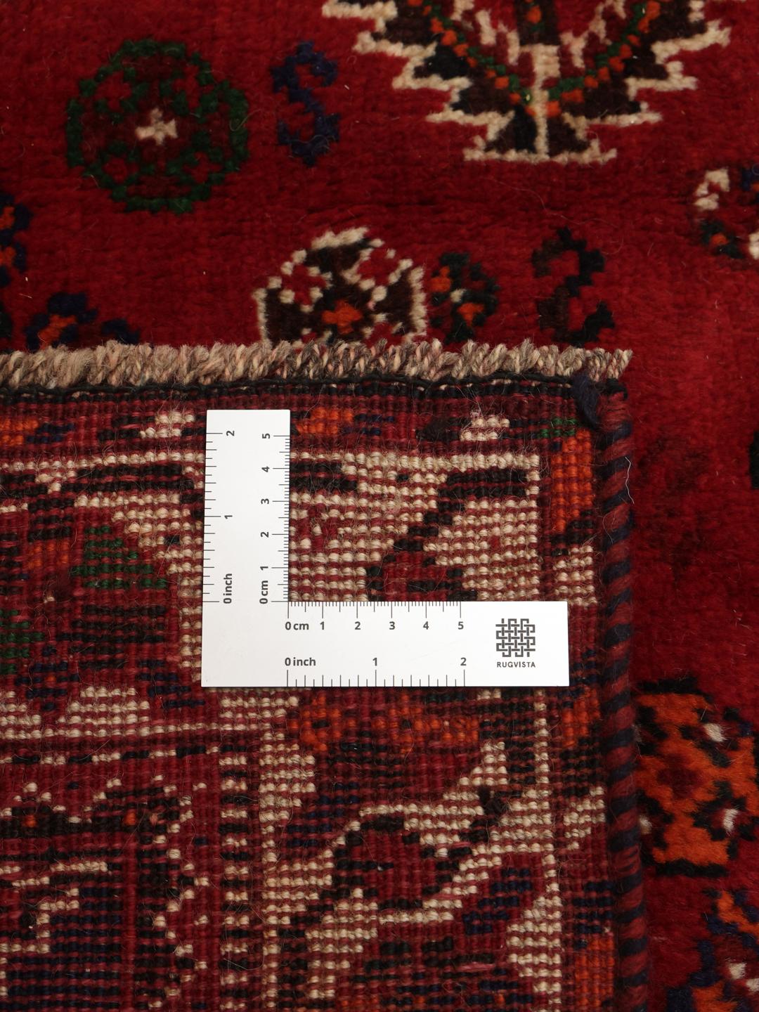 Hand-knotted Shiraz rug from the Middle East in dark red and dark blue
