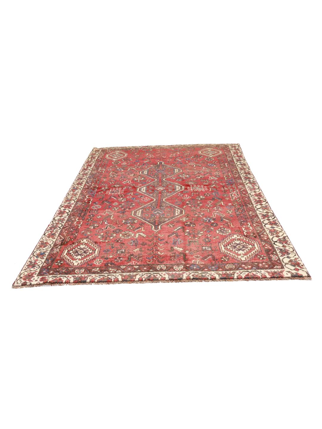 Hand-knotted Shiraz rug from the Middle East in deep red tones