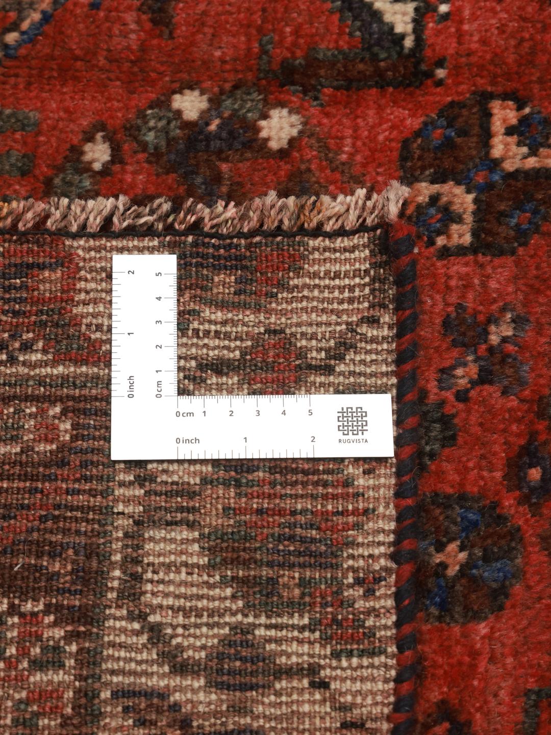Hand-knotted Shiraz rug from the Middle East in deep red tones