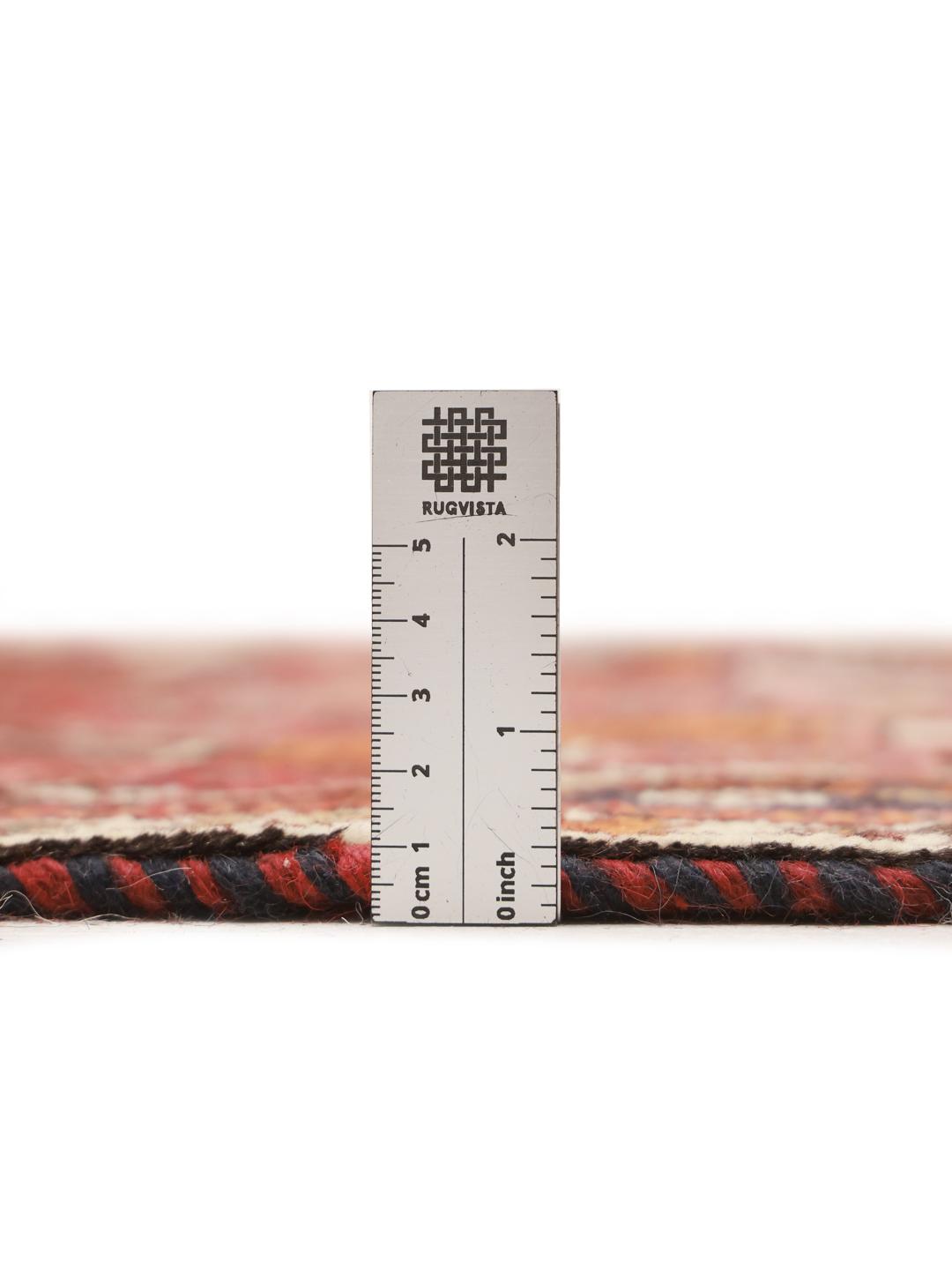 Hand-knotted Ghashghai rug with red and blue tribal geometric patterns from the Middle East