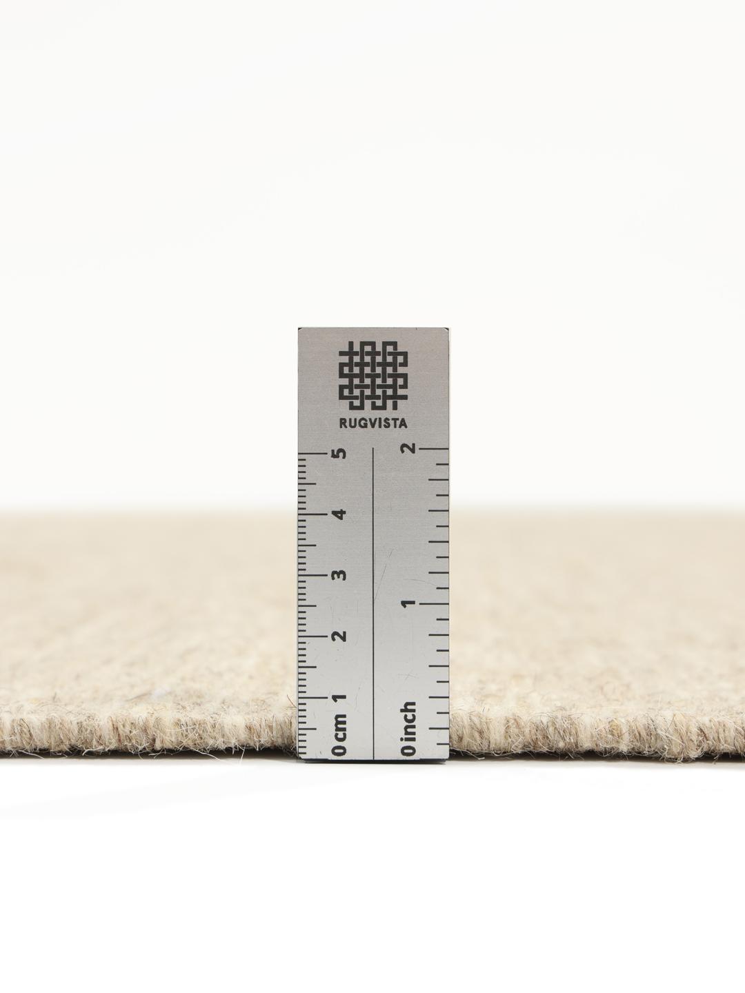 Beige tapijt met een getextureerde wollen afwerking