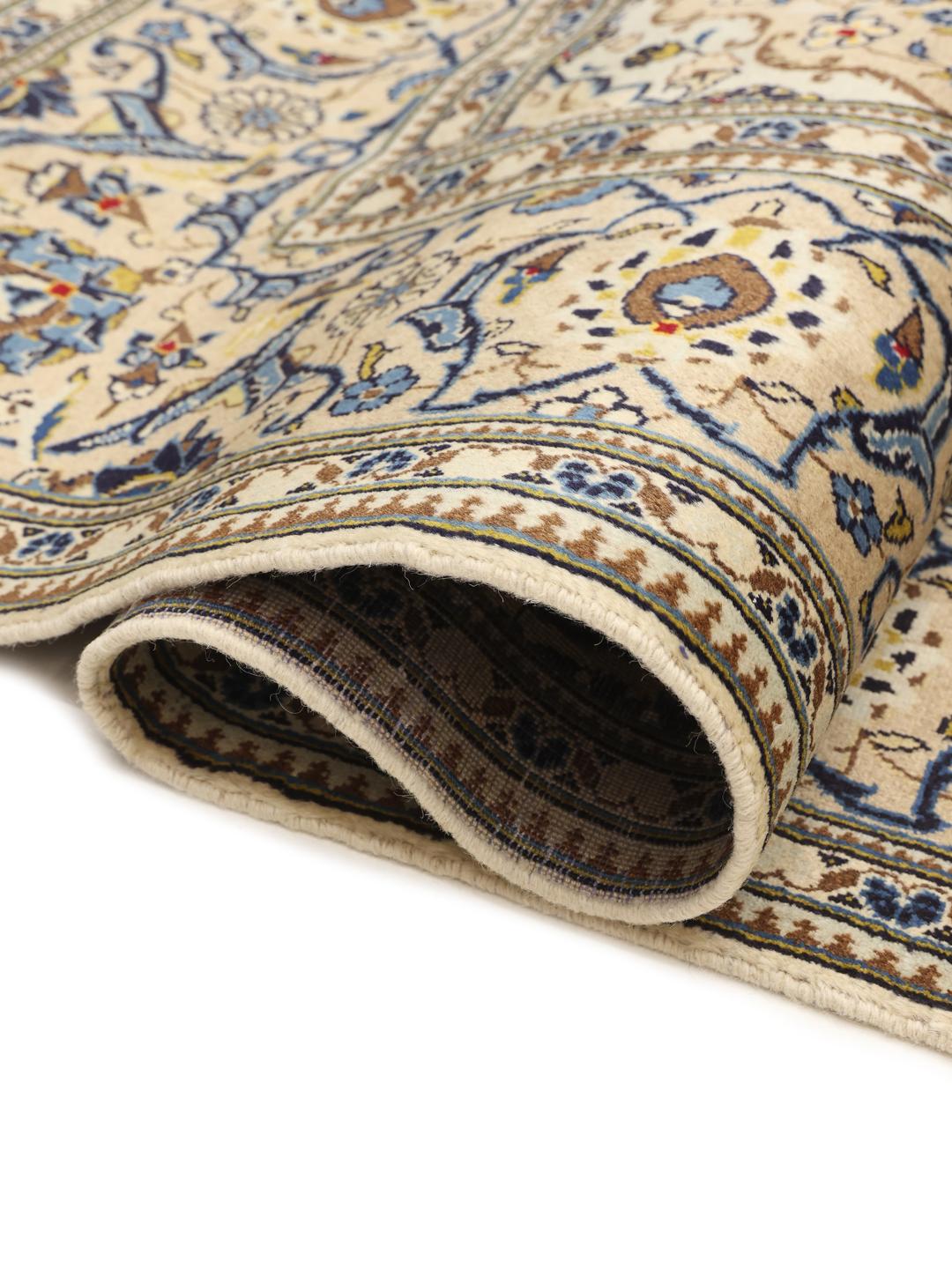 Hand-knotted Keshan rug from the Middle East with a beige and blue floral medallion pattern