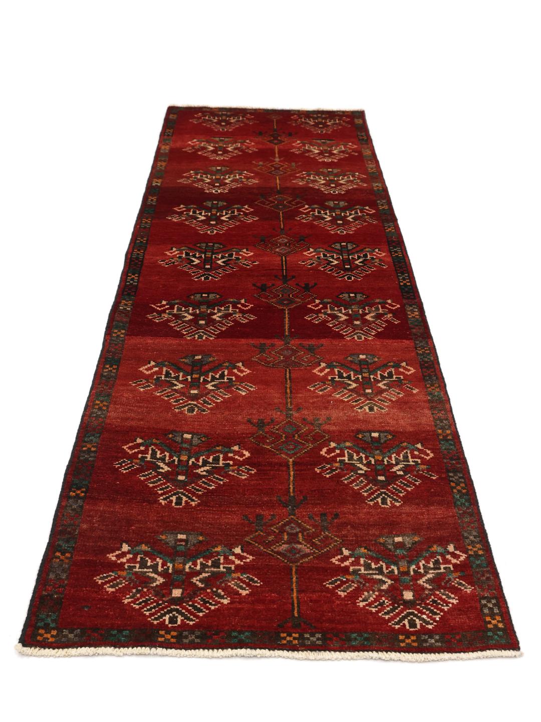Hand-knotted Shiraz runner in deep red with geometric tribal motifs