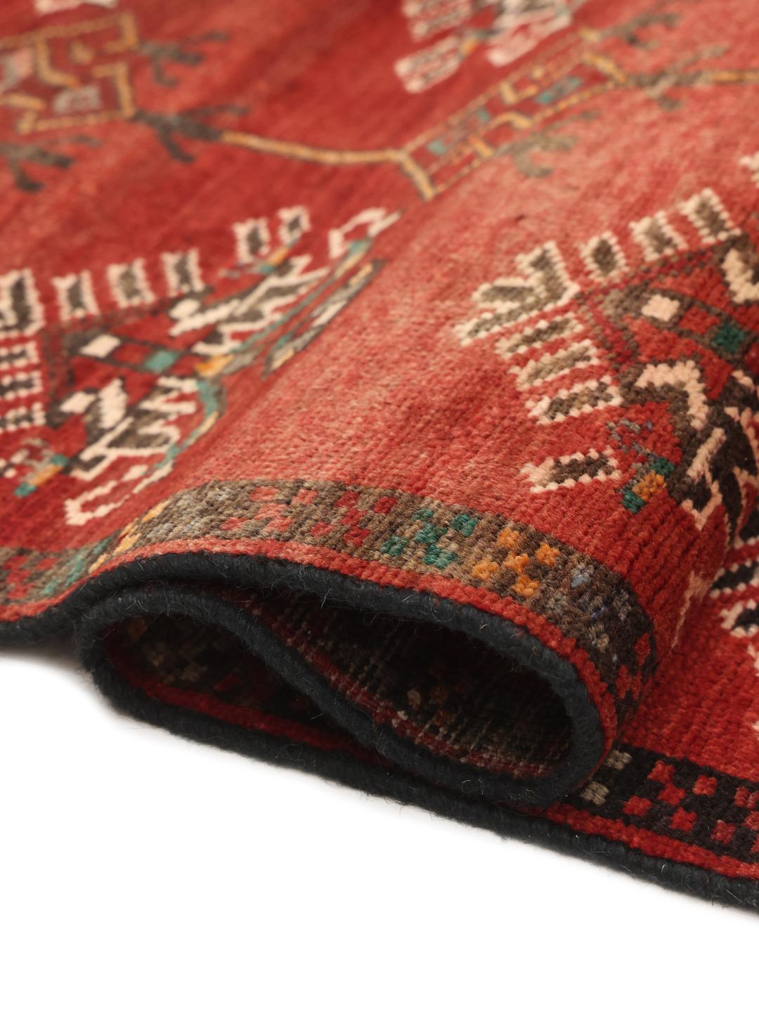 Hand-knotted Shiraz runner in deep red with geometric tribal motifs