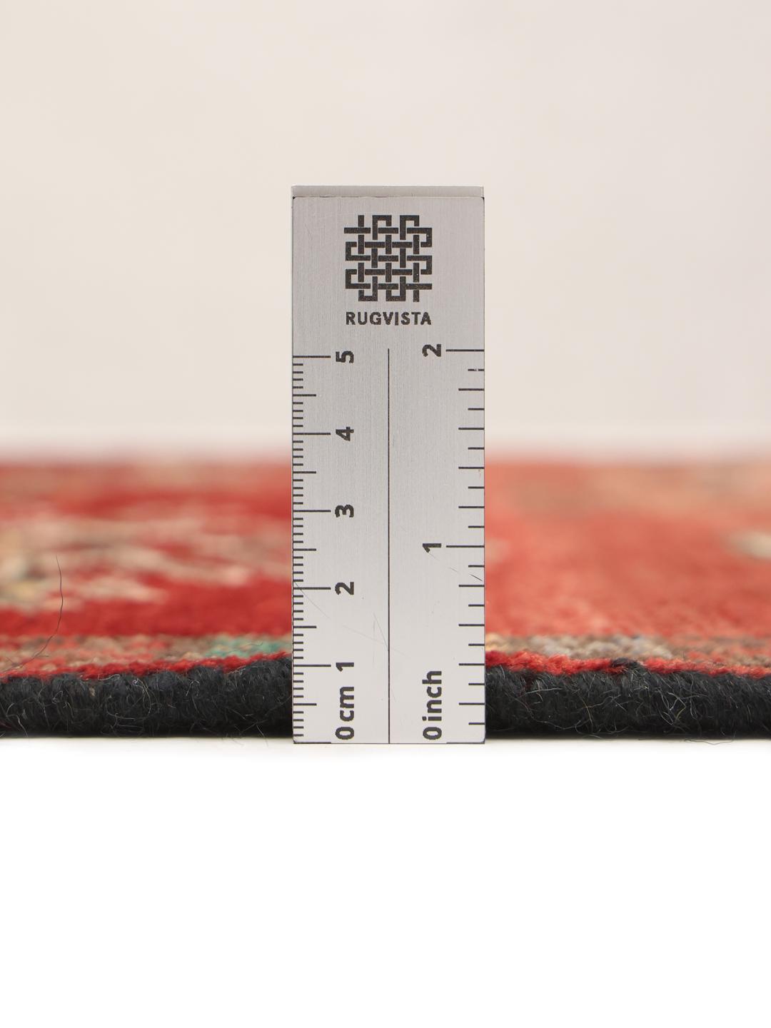 Hand-knotted Shiraz runner in deep red with geometric tribal motifs