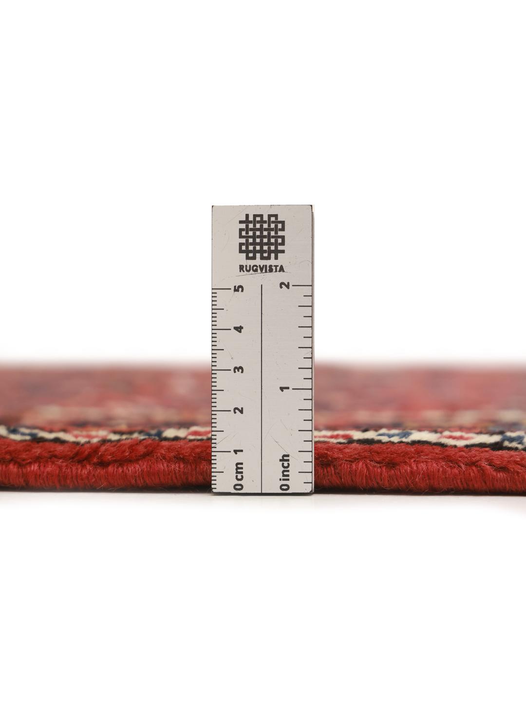Hand-knotted Hosseinabad runner with traditional Middle Eastern motifs in red and dark blue