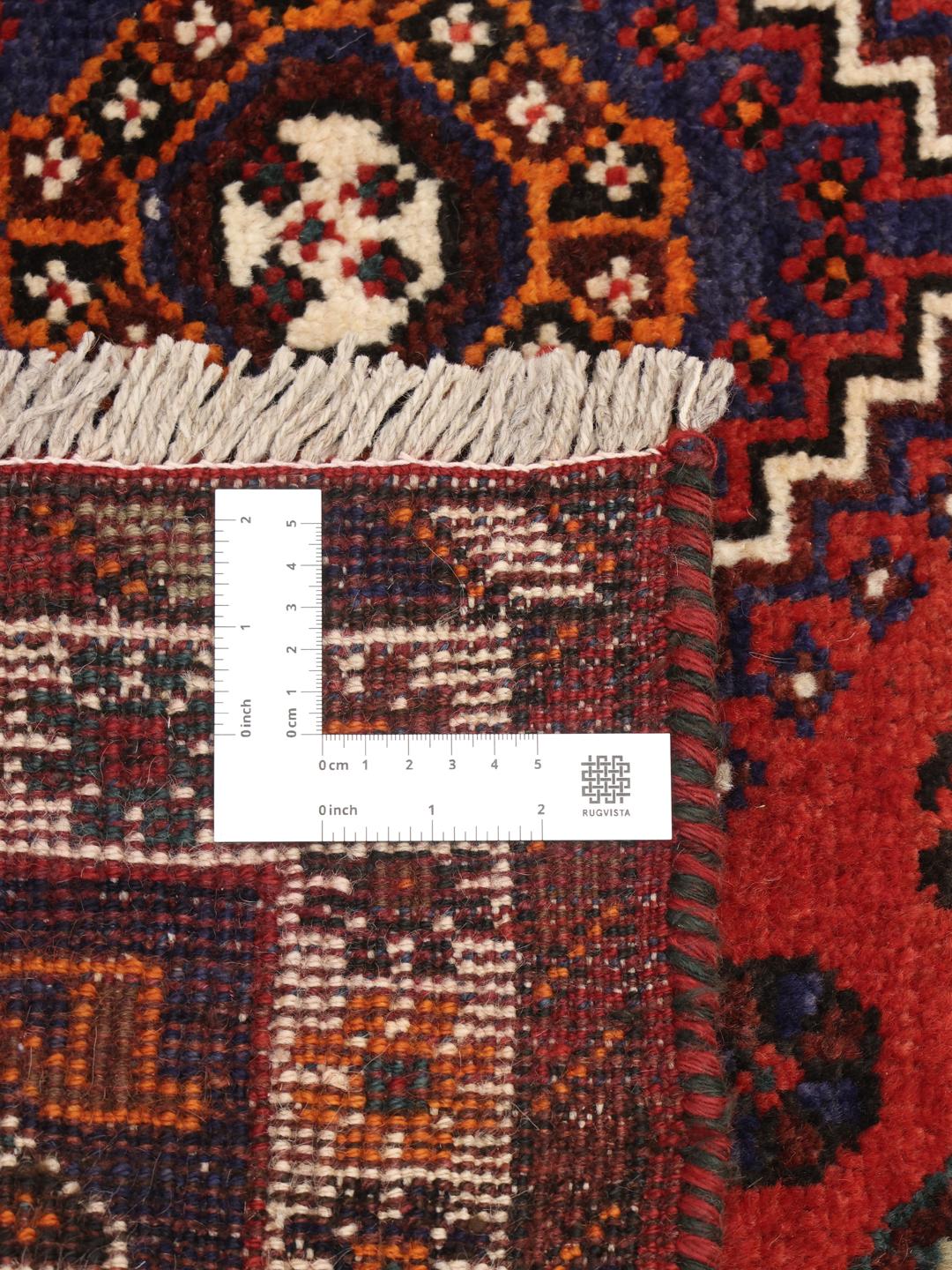 Hand-knotted Shiraz rug from the Middle East in red and blue