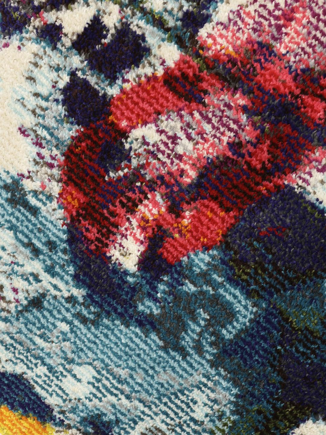Multicolor vloerkleed met een abstract patroon