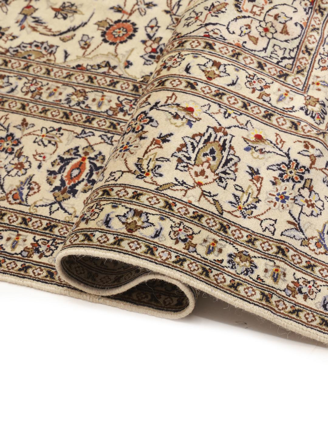 Hand-knotted Keshan rug from the Middle East with a floral pattern in beige and blue