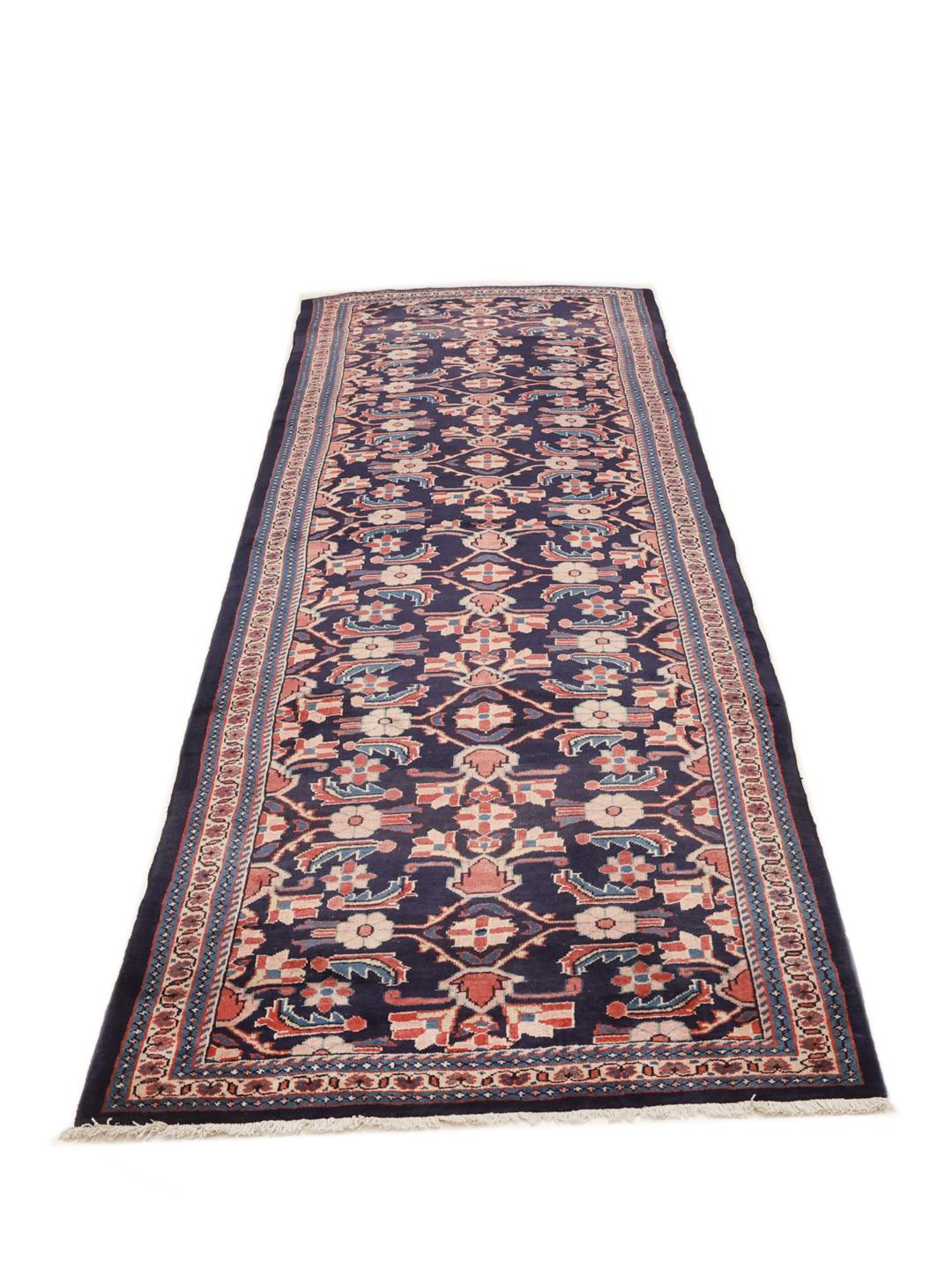 Hand-knotted Middle Eastern Hamadan runner in dark-blue with floral patterns