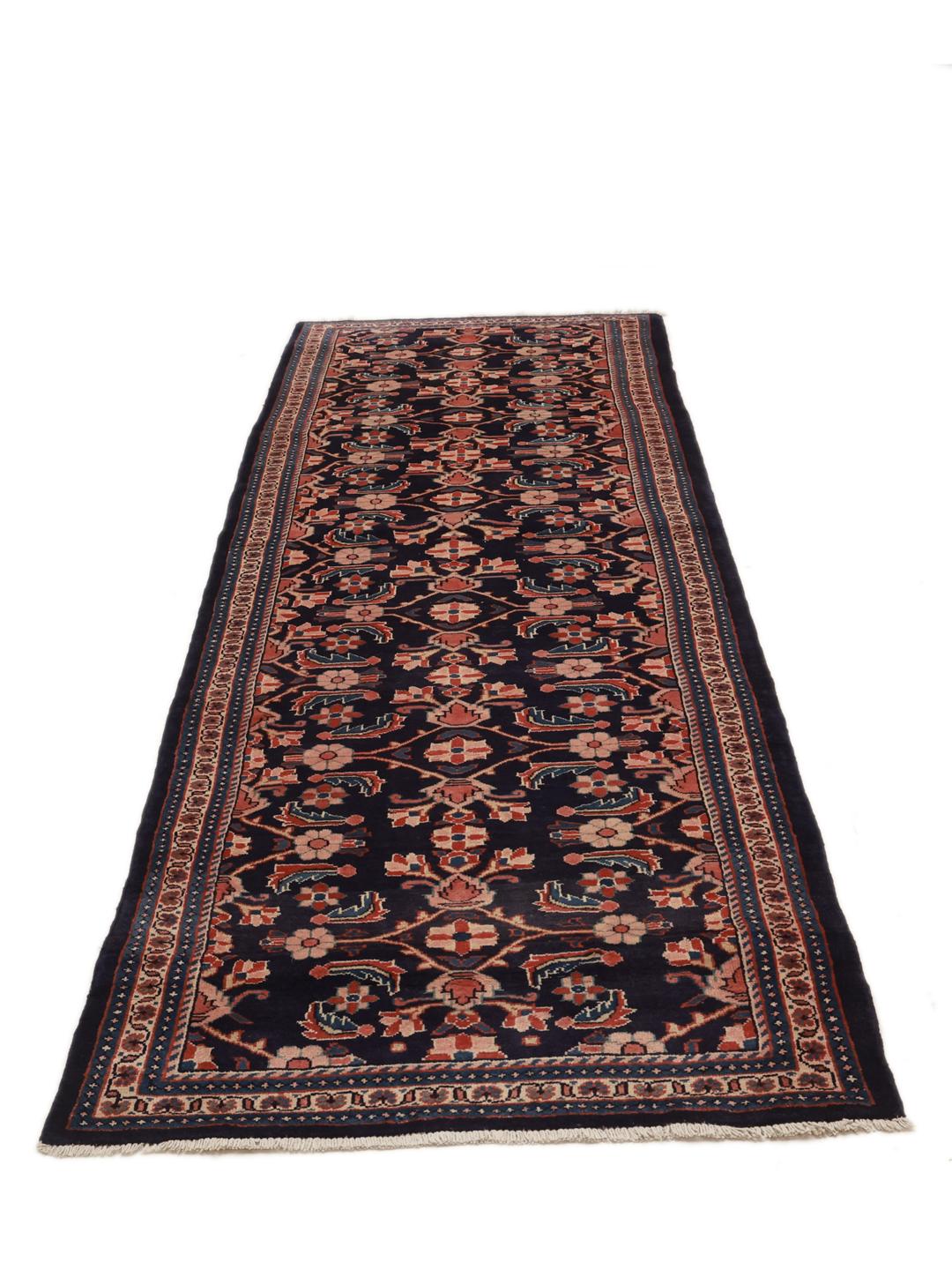 Hand-knotted Middle Eastern Hamadan runner in dark-blue with floral patterns