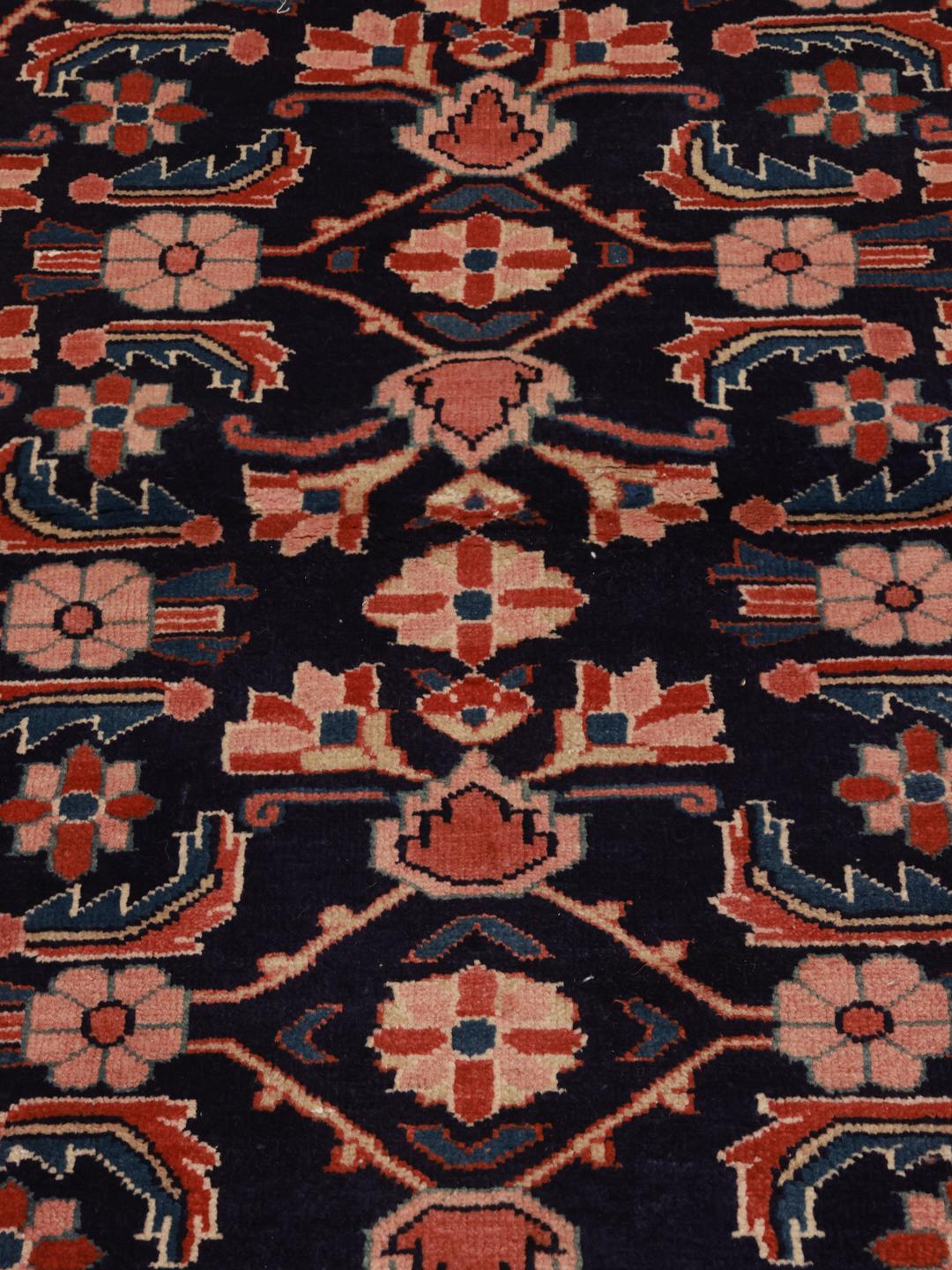 Hand-knotted Middle Eastern Hamadan runner in dark-blue with floral patterns