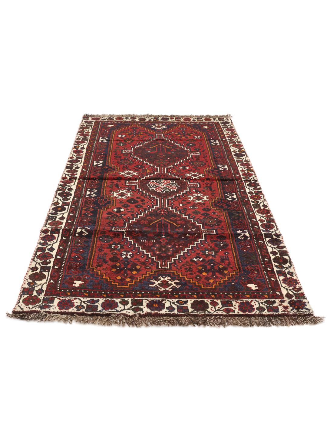 Hand-knotted Shiraz rug in dark red and black with tribal geometric patterns