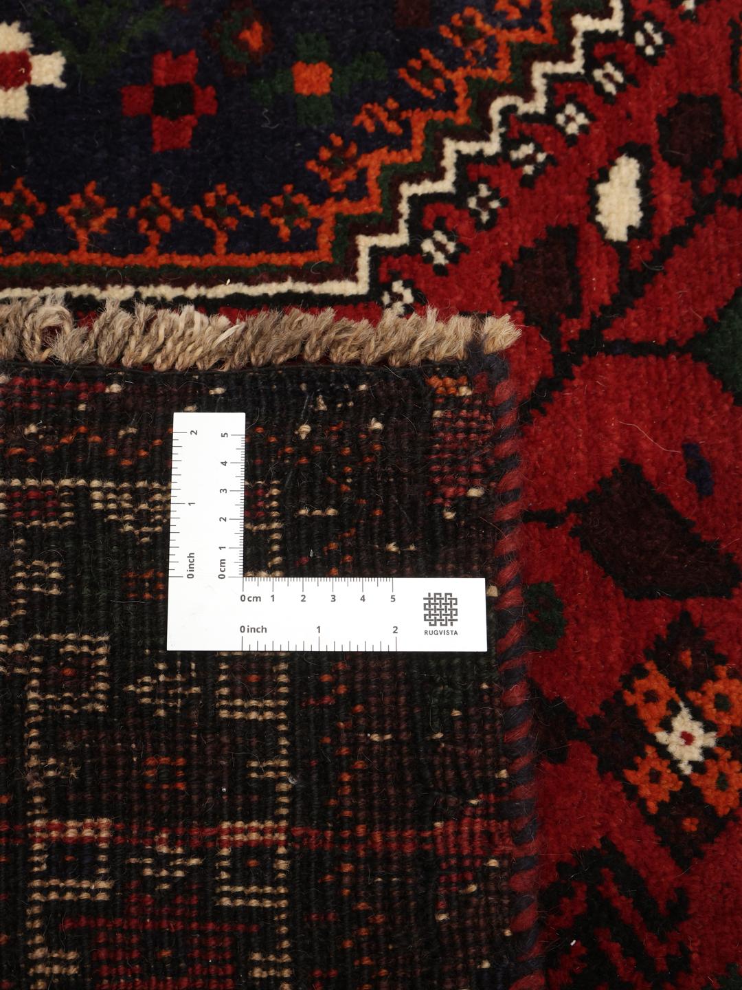Hand-knotted Middle Eastern rug in dark red and dark blue