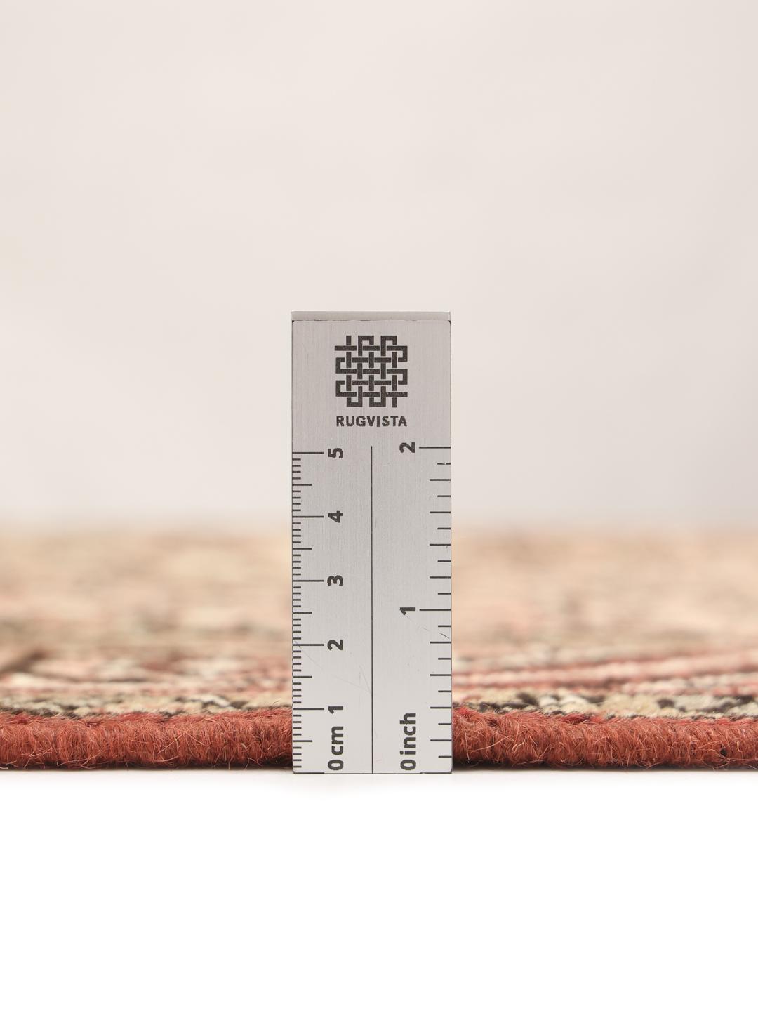 Hand-knotted Hosseinabad rug from the Middle East in red and cream tones
