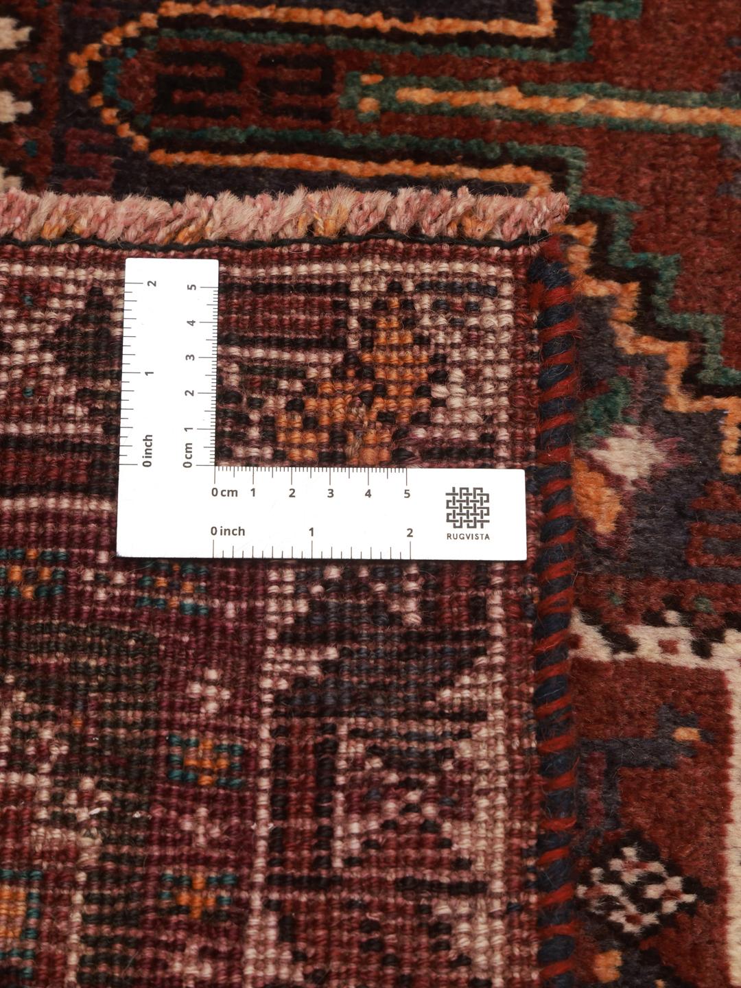 Hand-knotted Shiraz rug from the Middle East in dark-red and multicolour